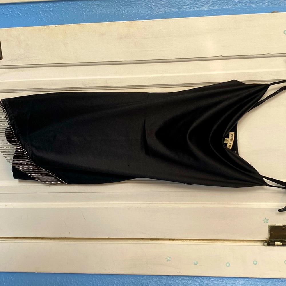 Selling a medium dress:) silky and has a little fringe at the bottom.